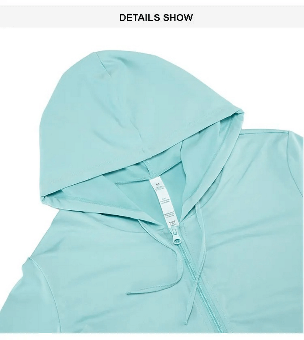 Close-up of a mint green hooded athletic jacket showing material details for women's sportswear set SF2090.